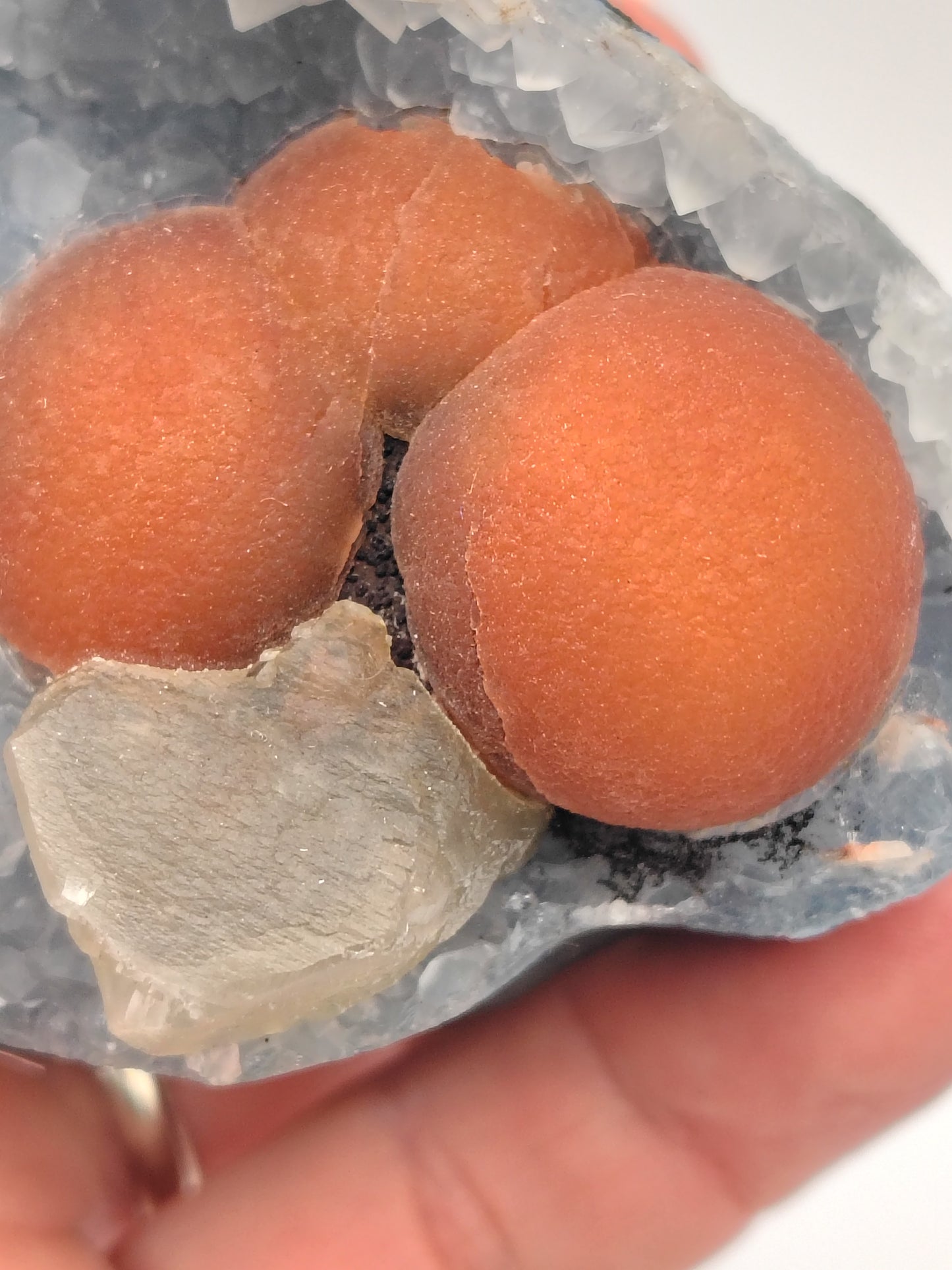 Red Fluorite Spheres and Calcite on Quartz